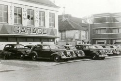 Het filiaal in 's-Hertogenbosch. op de voorgrond een auto met een Noord-Hollands kenteken